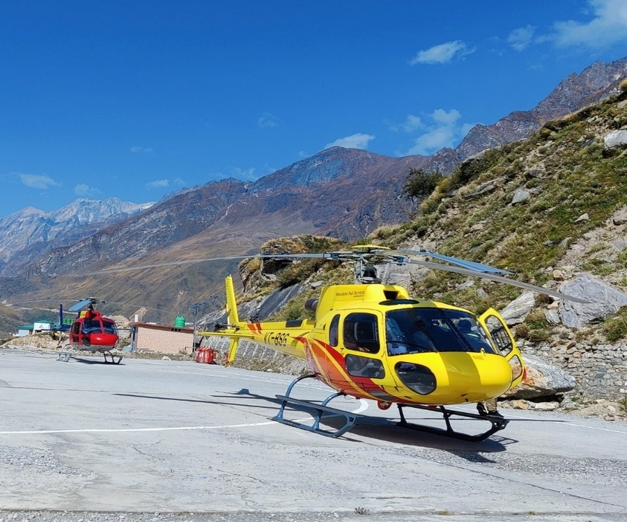 "Helicopter joyride offering breathtaking views of snow-capped peaks in Gulmarg, Kashmir"