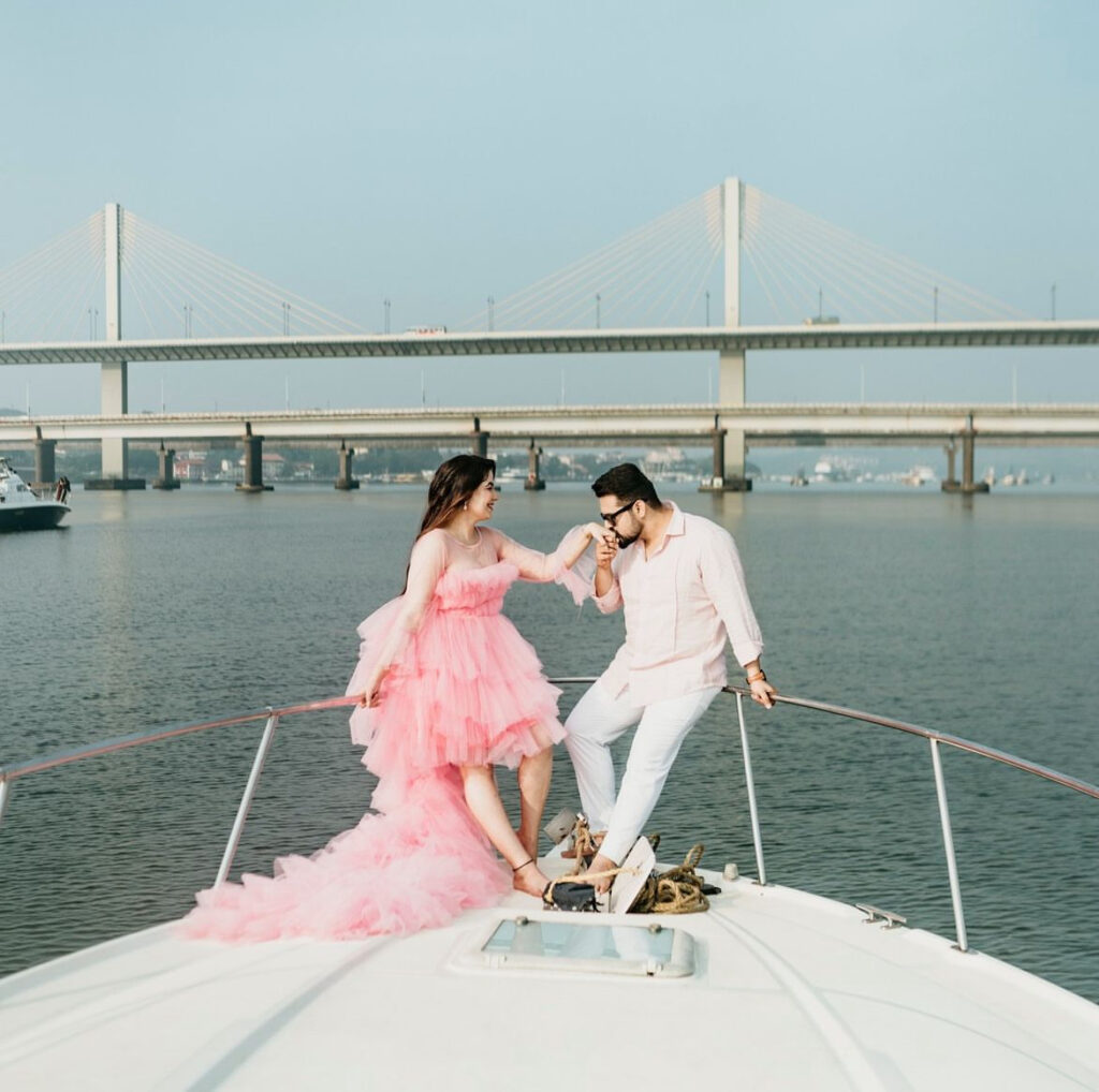 Panoramic helicopter view of a couple on a private yacht charter.