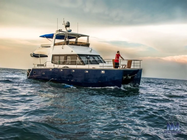 Blue-And-White-Catamaran-Private-Yacht-Goa
